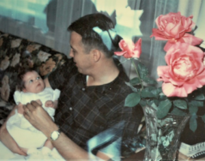 Amy as a baby with her father, Mike.