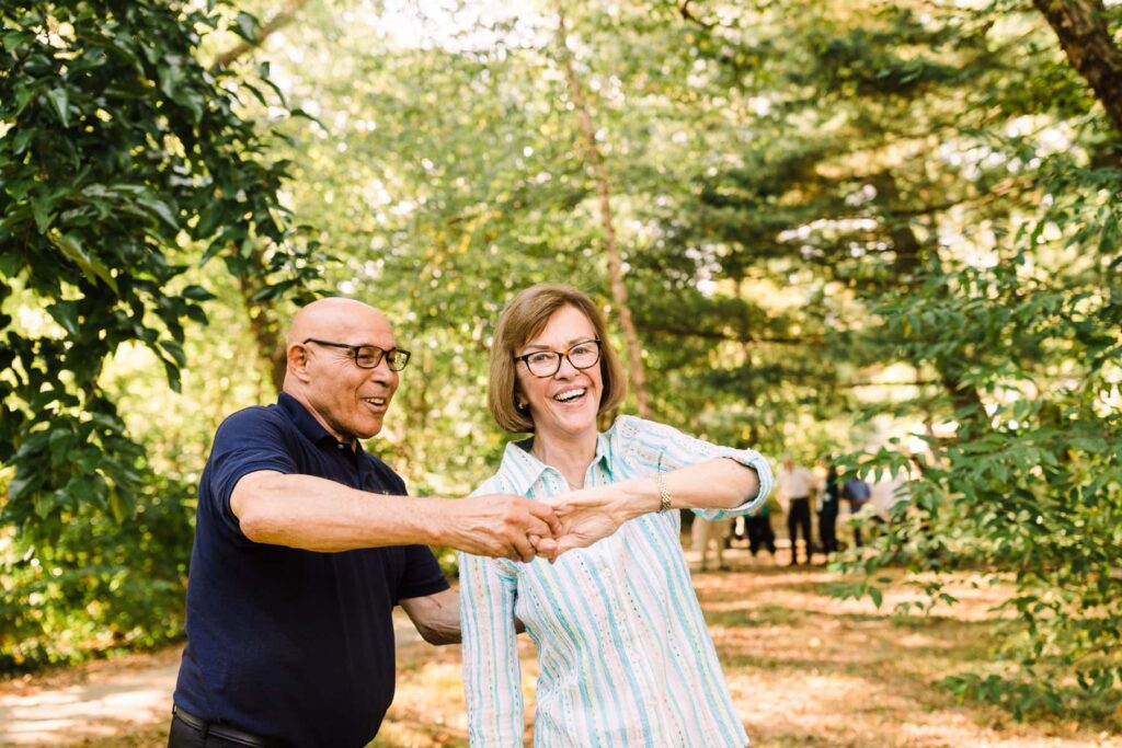 Resident and Team member dancing