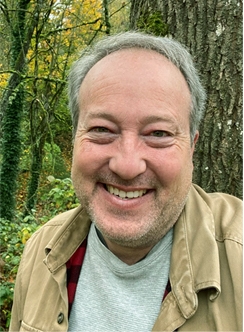 headshot of author smiling