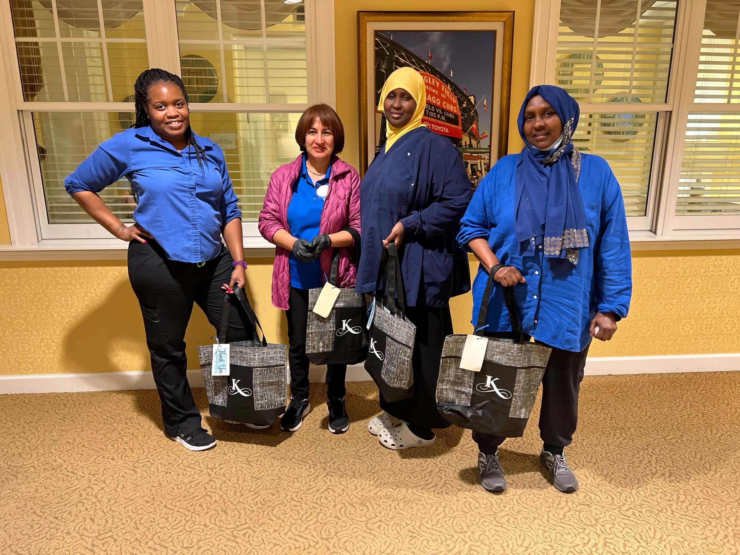 care team members with gift bags