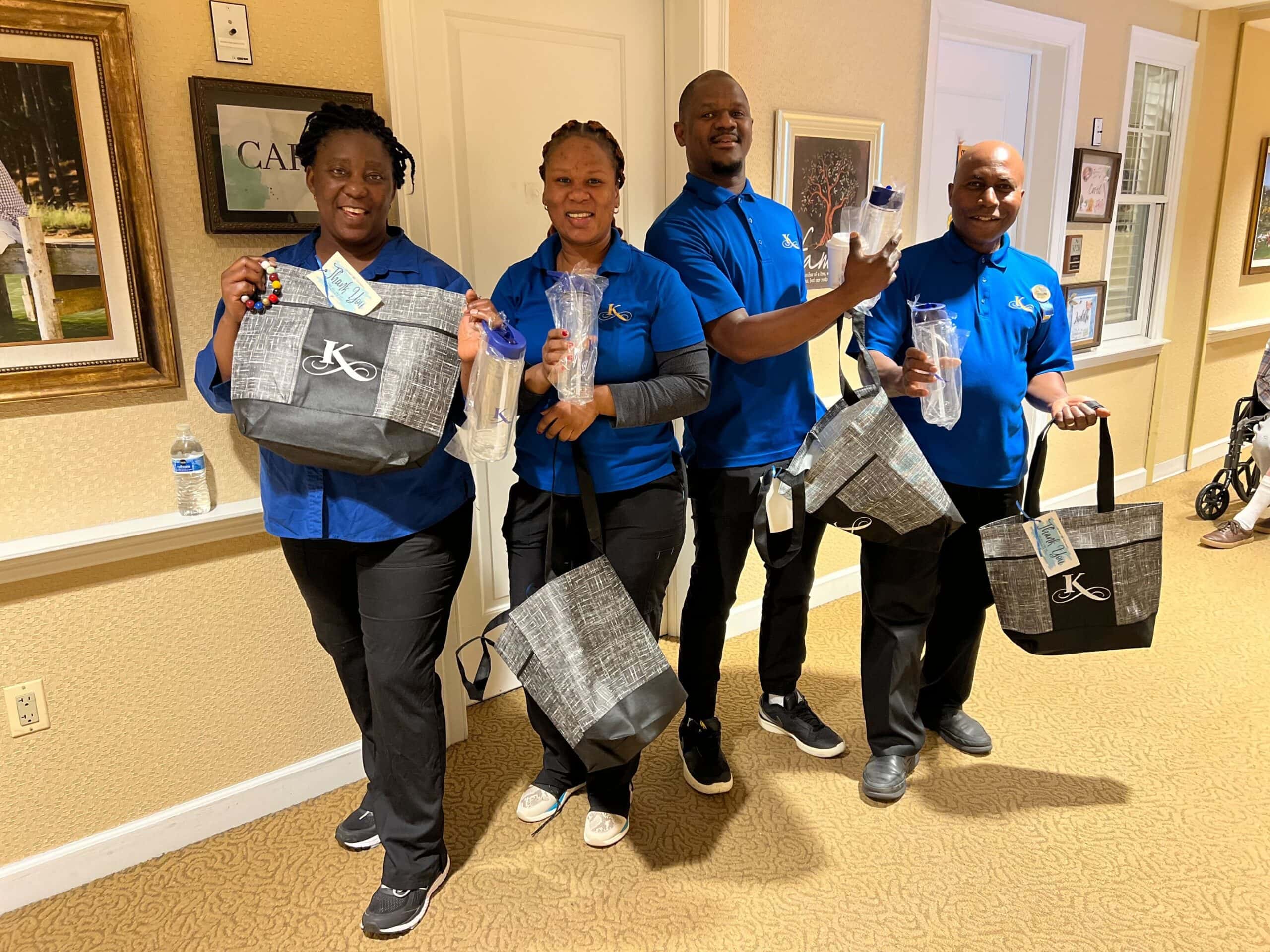 care team members with gift bags