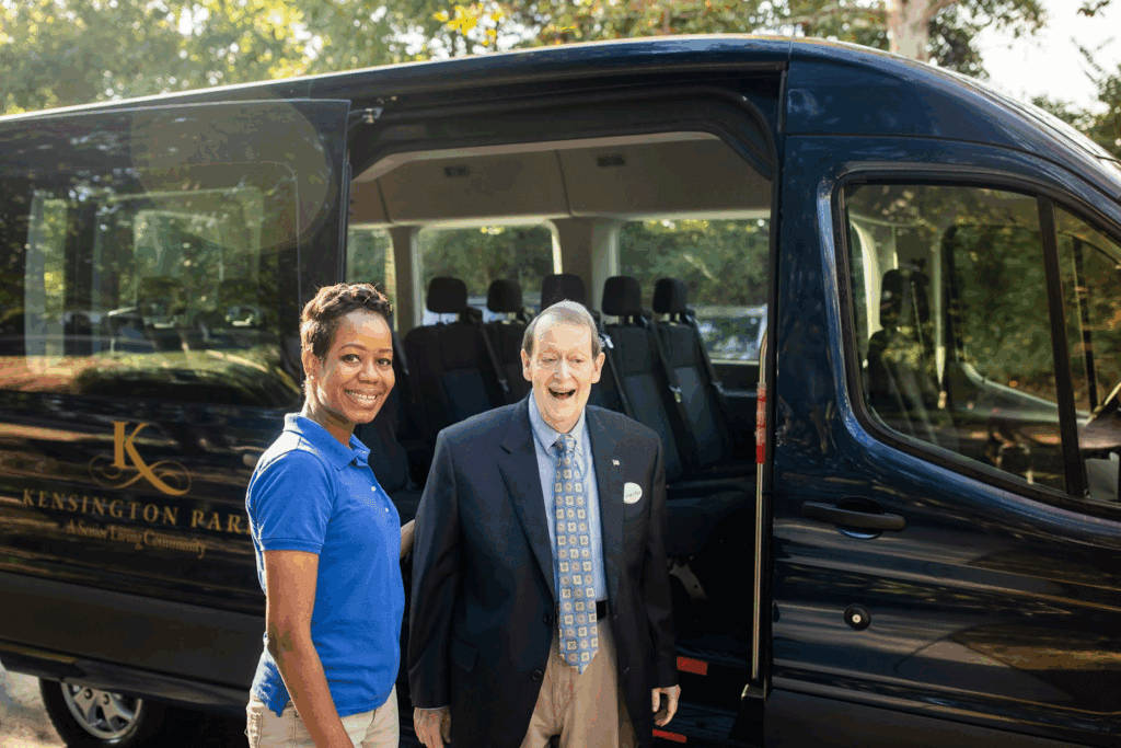 an older man being led off a bus with a younger woman
