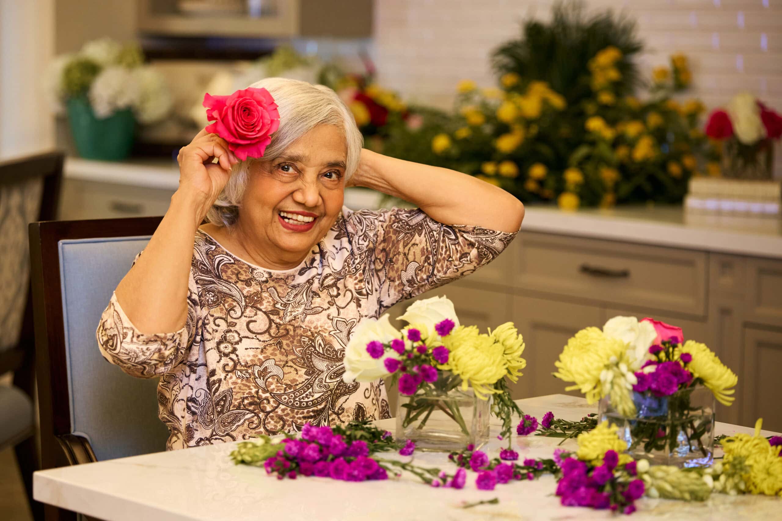 Older women doing flower arrangements